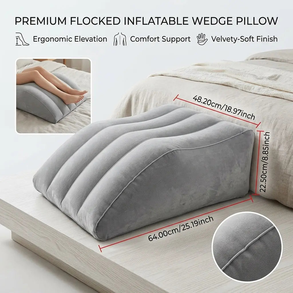 Adjusting the firmness of a portable leg elevation pillow by pressing down on the inflatable material with one hand