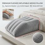 Adjusting the firmness of a portable leg elevation pillow by pressing down on the inflatable material with one hand