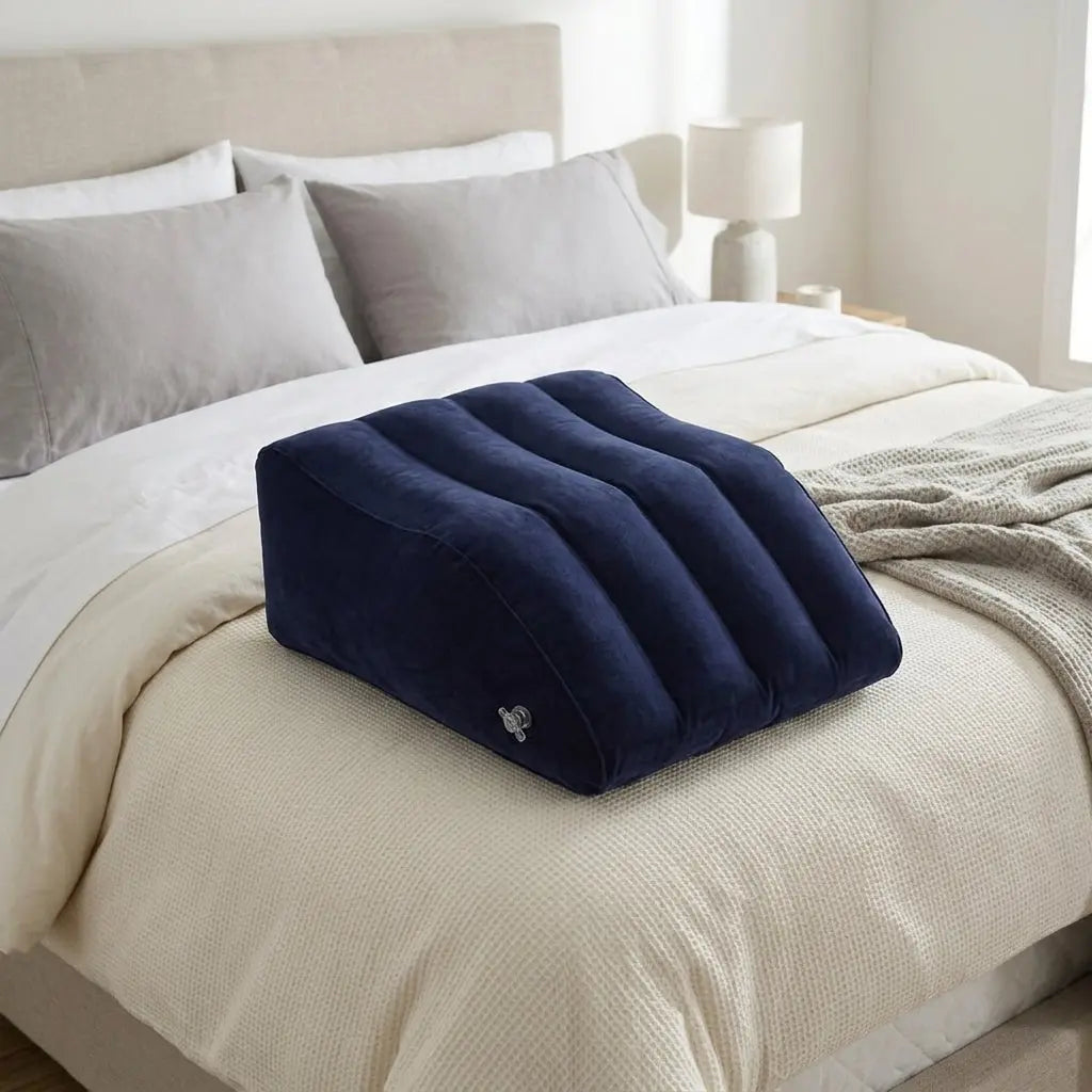 Electric pump inflating leg elevation pillow on bed in under 60 seconds