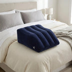 Electric pump inflating leg elevation pillow on bed in under 60 seconds